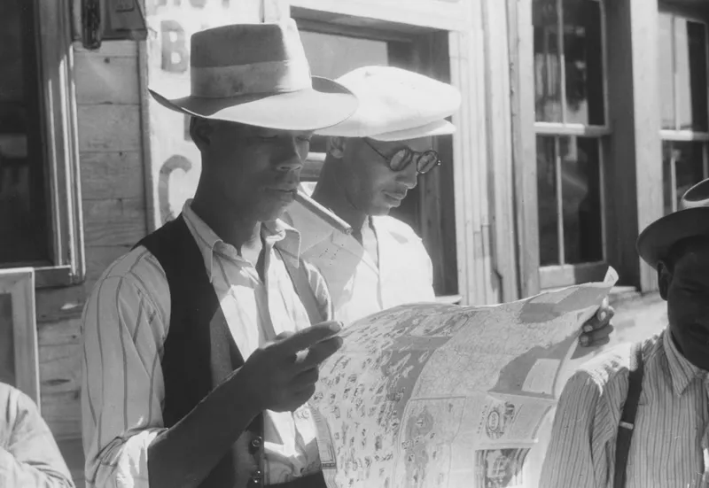 Road trip budget planning with map and calculator